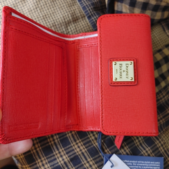 firm on priceSmall Dooney & Bourke Wallet like New color Tomato 🍅